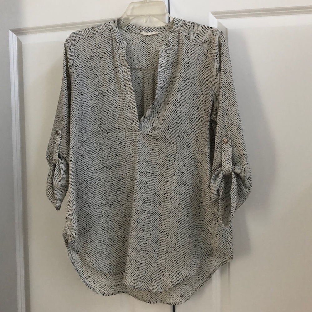 Flowy black and white patterned top